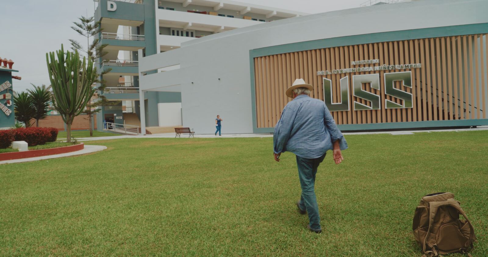 Stan Herd walking the lawn where the portrait will be built